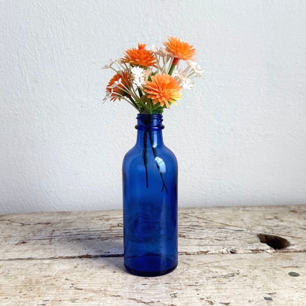 Vintage Cobalt Blue Glass Bottle Bud Vase with Artificial Flowers 5.25"